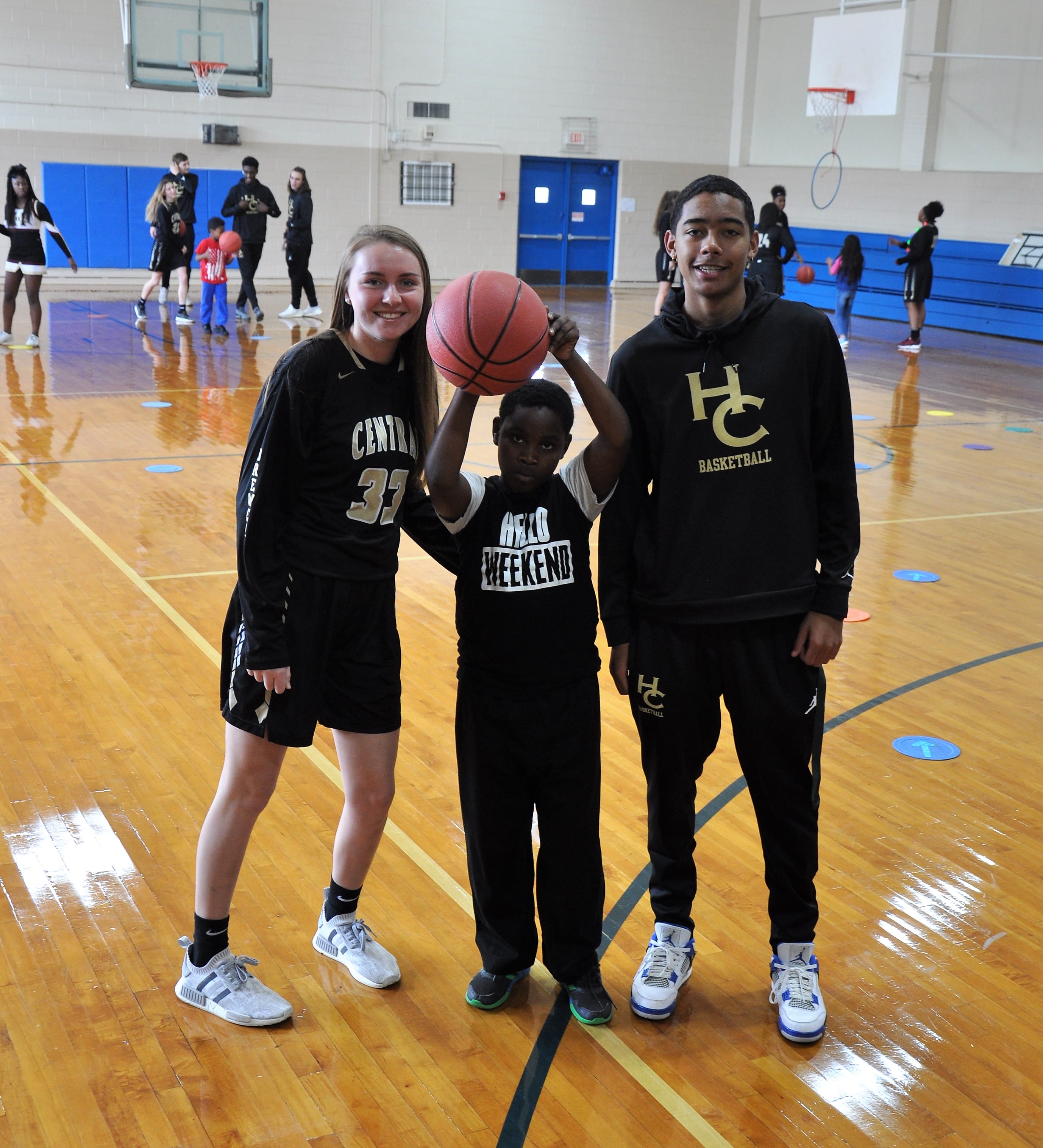 Central players bring annual Christmas cheer, give out basketballs