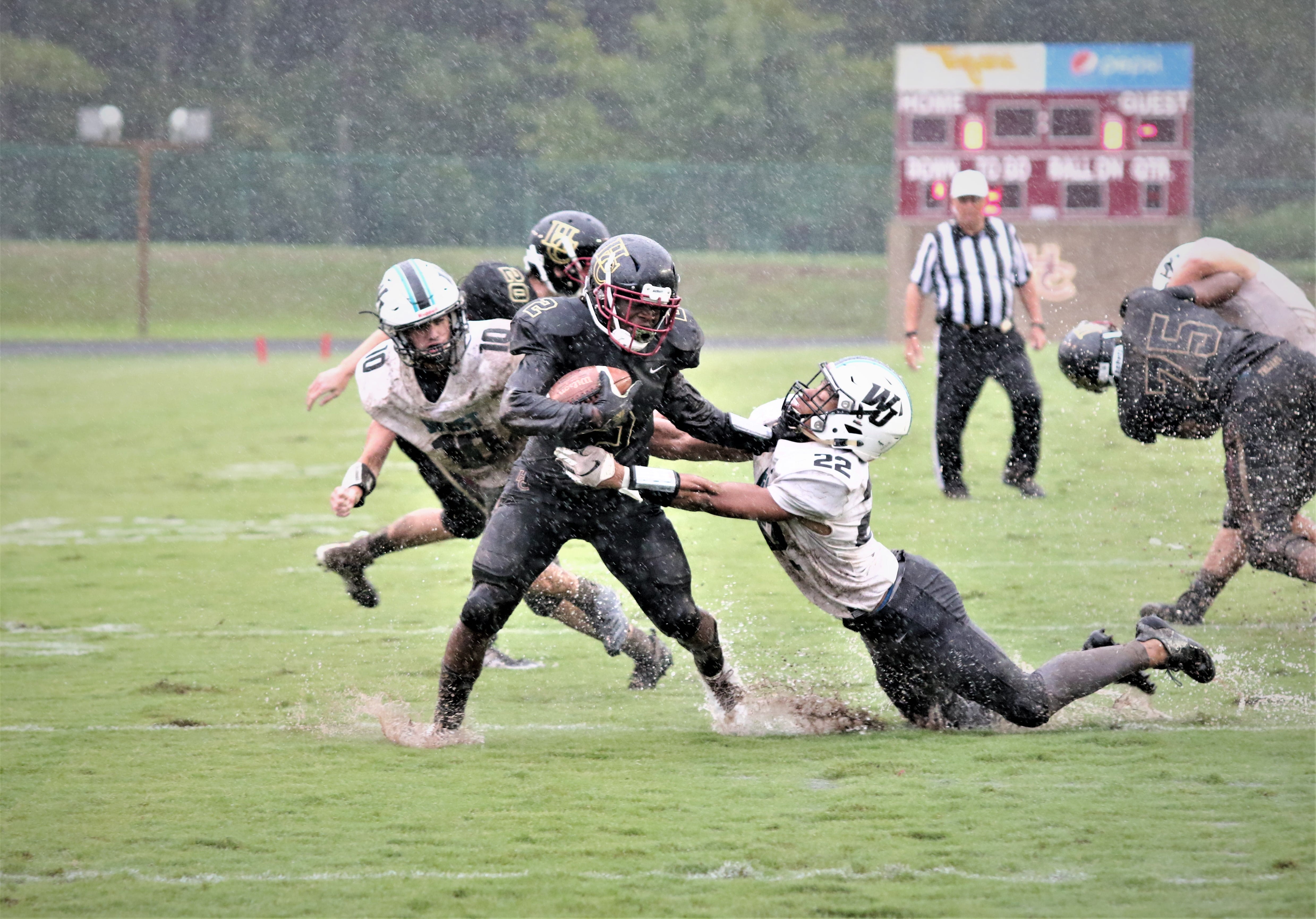 HC Trojans slosh to 7-0 season-opening win over West Johnston