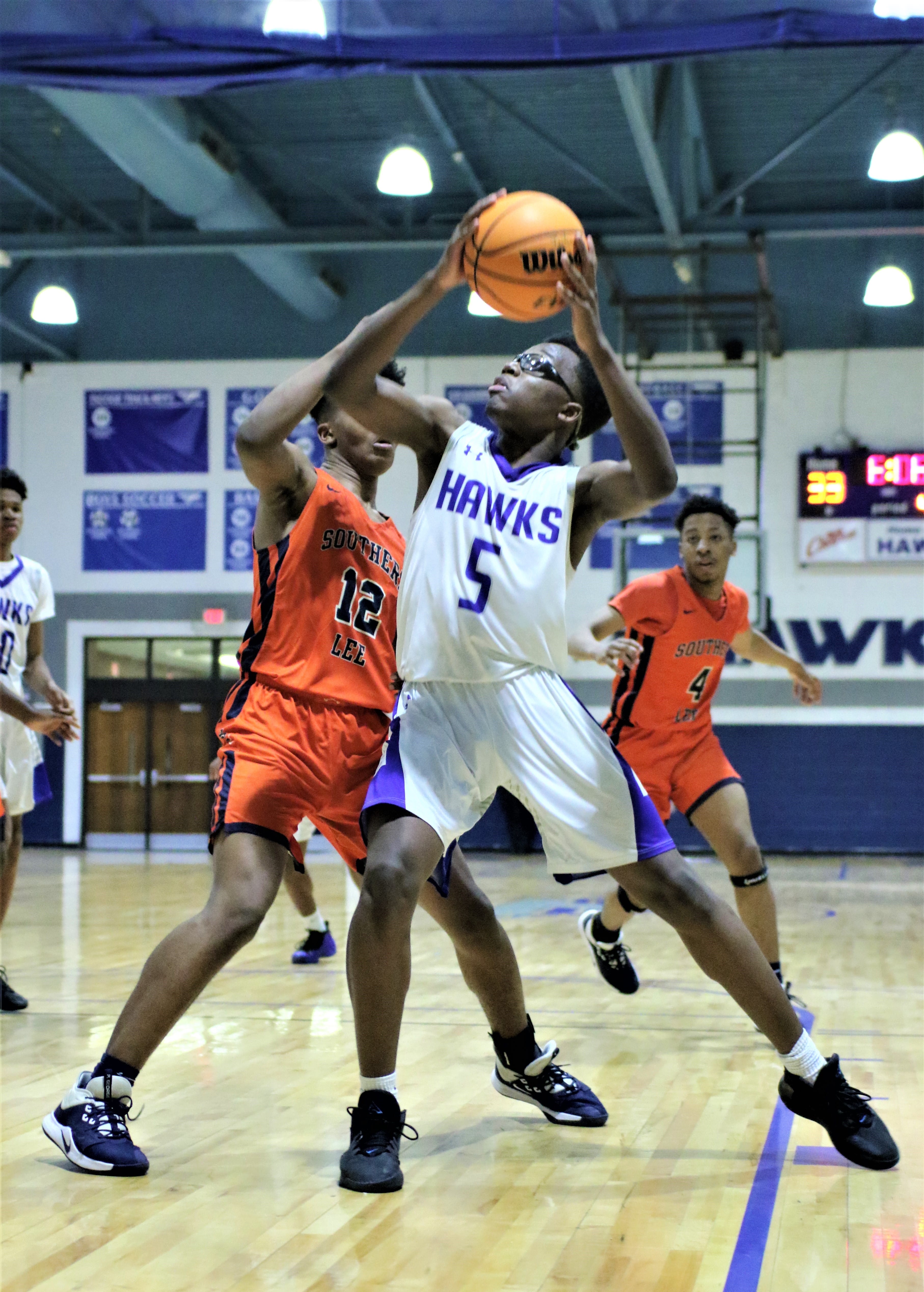 Hawk boys win big on Senior Night
