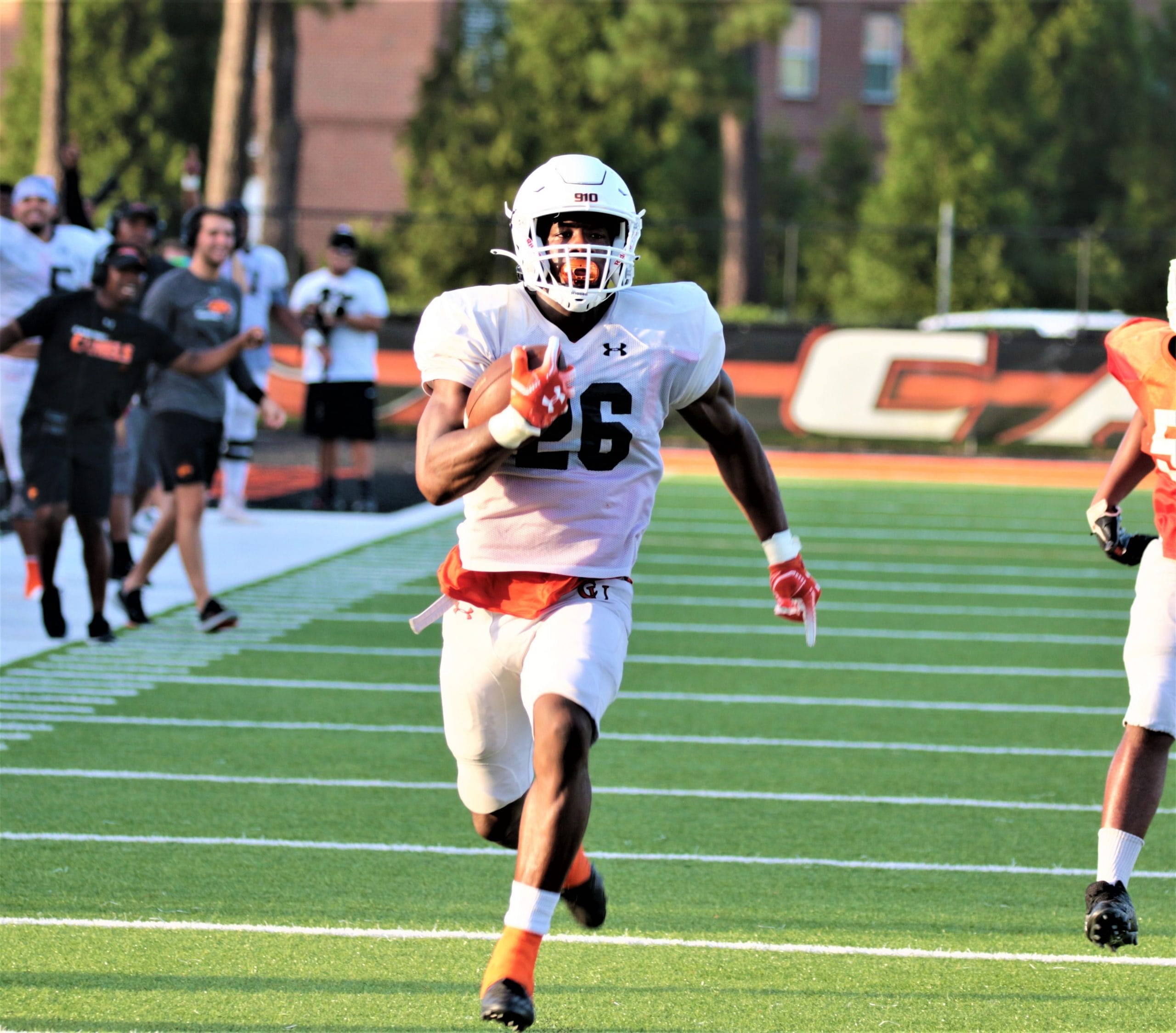Campbell holds football scrimmage