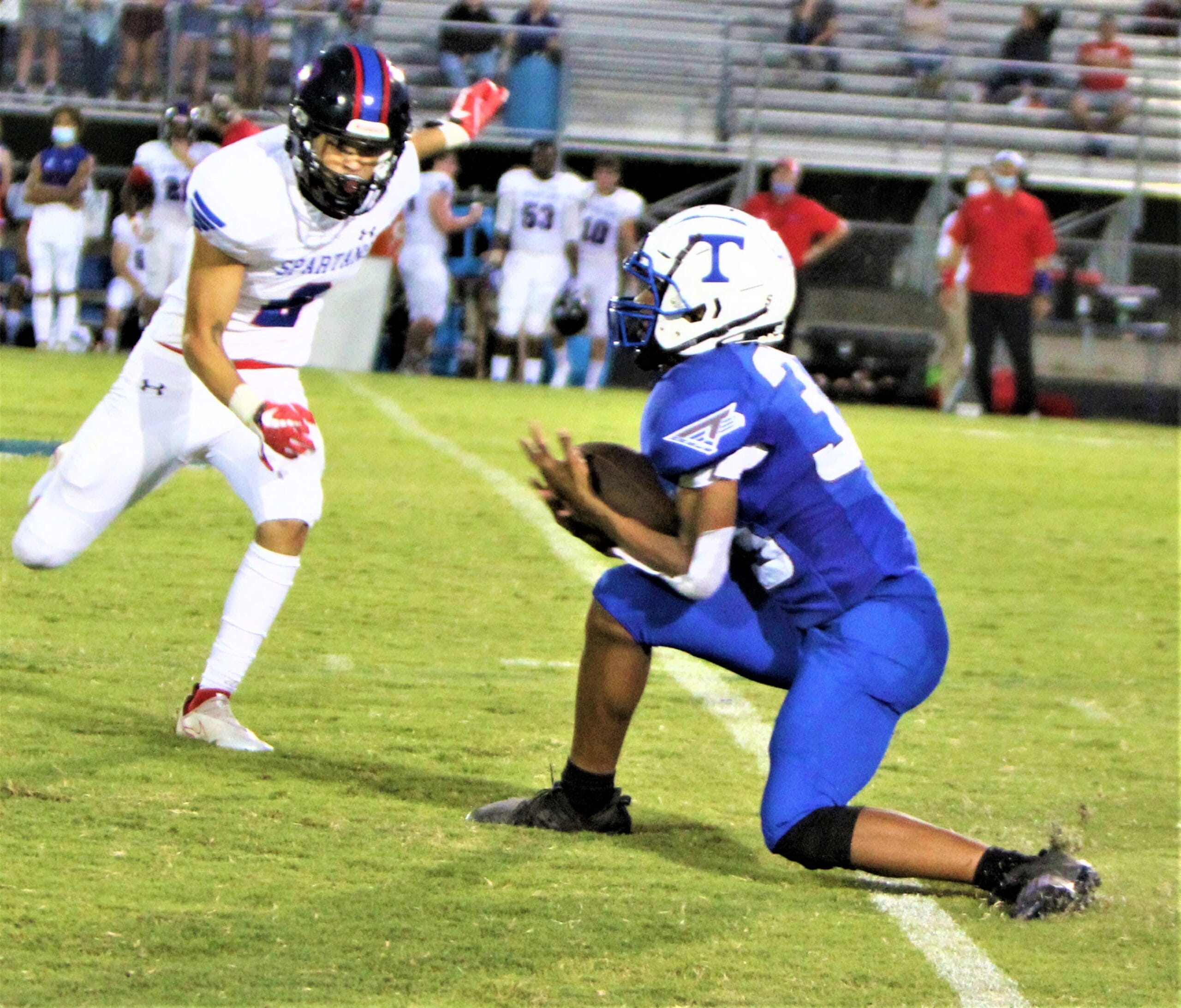 Depleted Hawks fall to comeback, 37-28