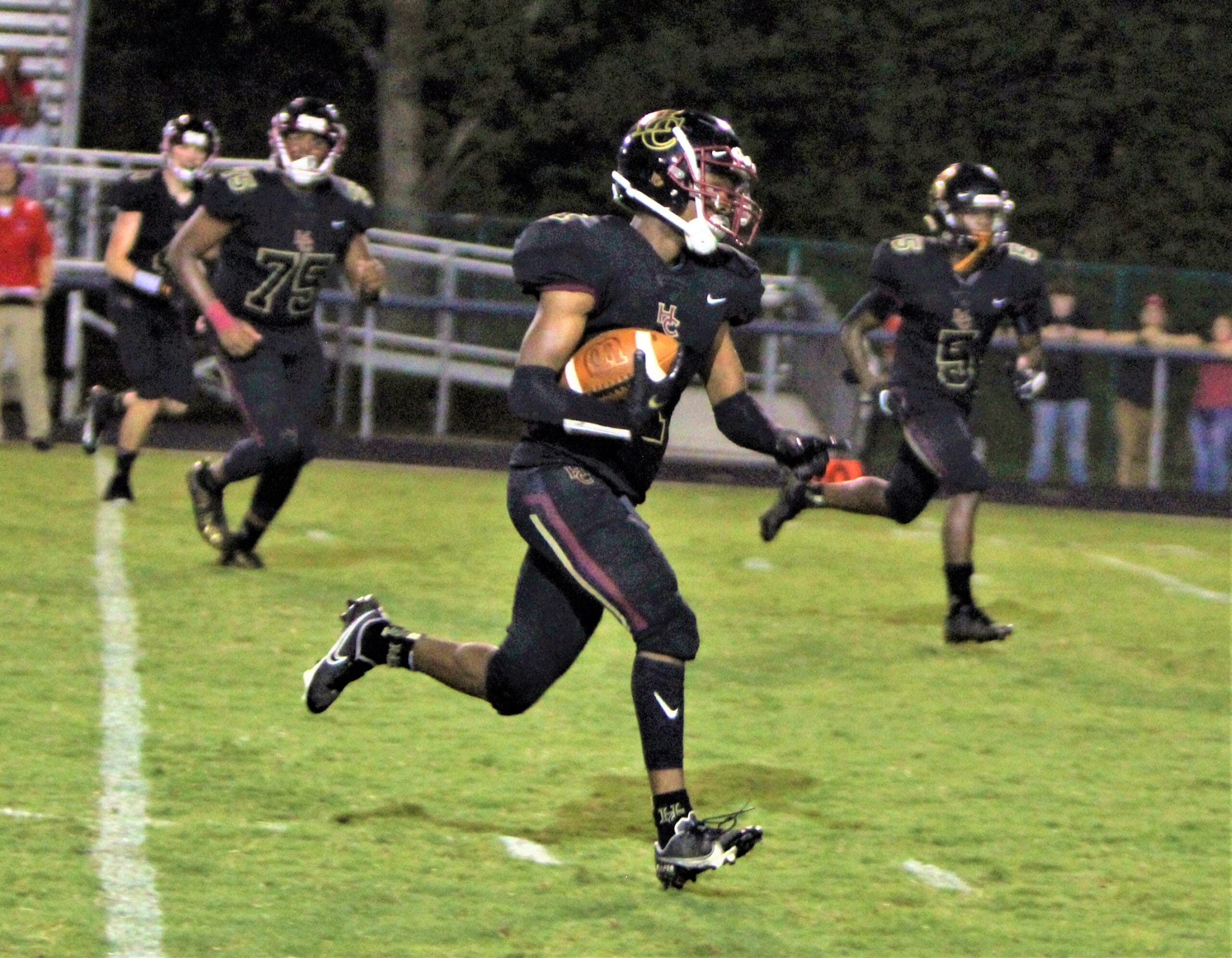 Trojans surge to take county battle with Western, 28-13