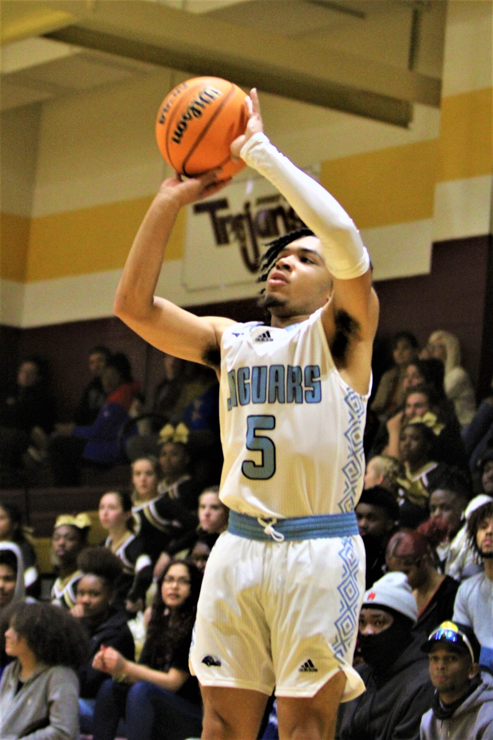 Overhills rolls past HC in boys final for eighth-straight tipoff title