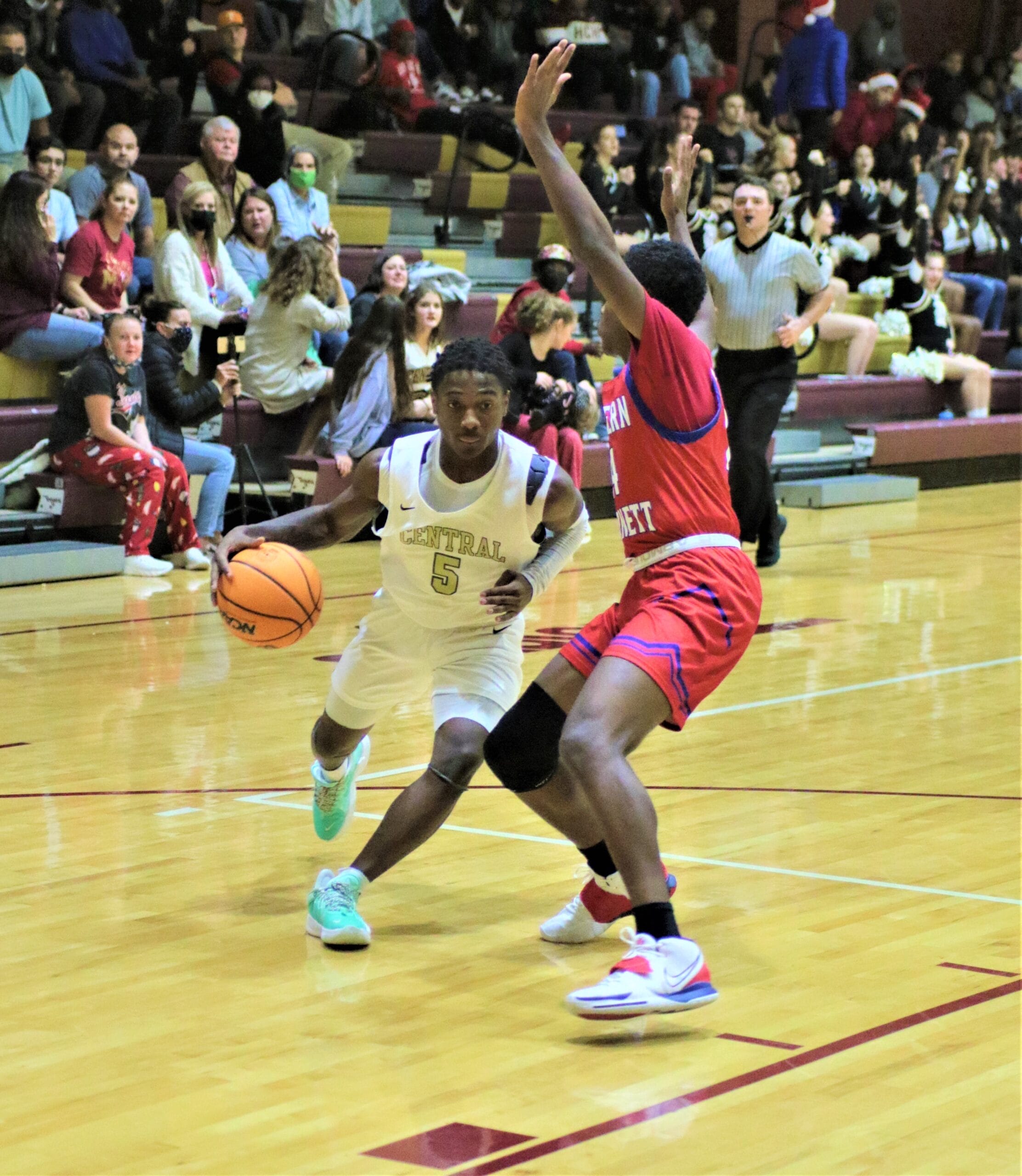 Central boys top Western on AAC opening night, Lady Eagles prevail