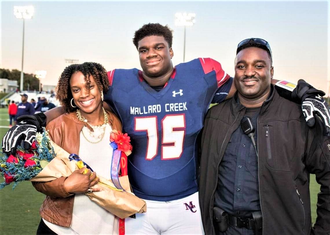 Son of Triton grad helps Georgia to CFP title