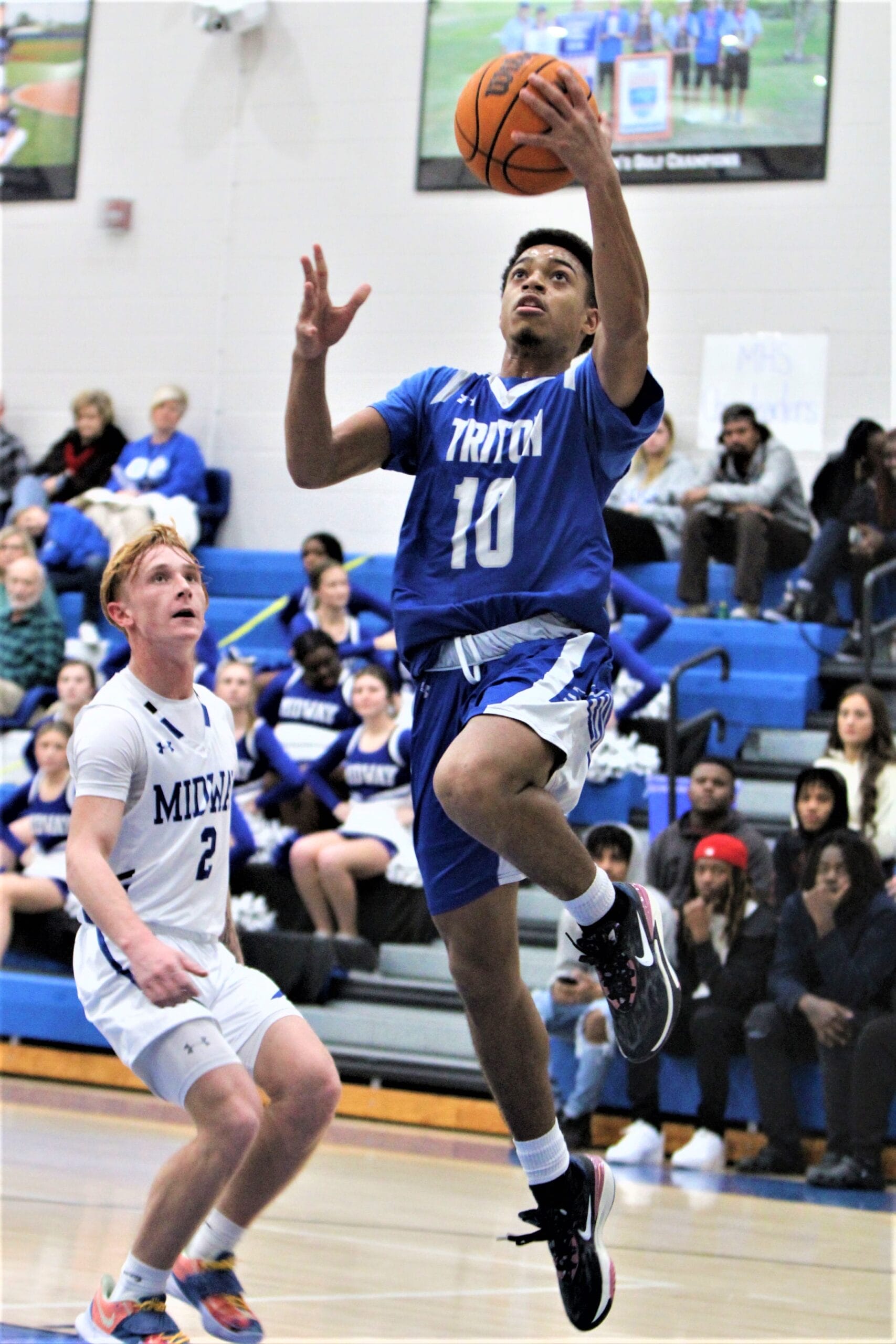 Triton boys come back for varsity sweep at Midway